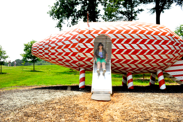 Karen Duquette on the pig-shaped slide